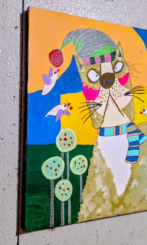 毛糸の帽子を被った猫