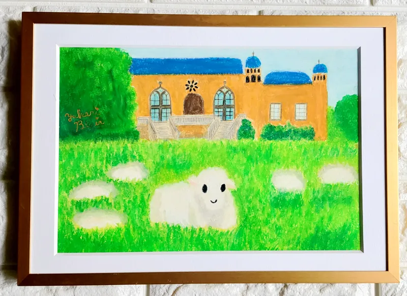 草をはむコッツウォルズの羊さん