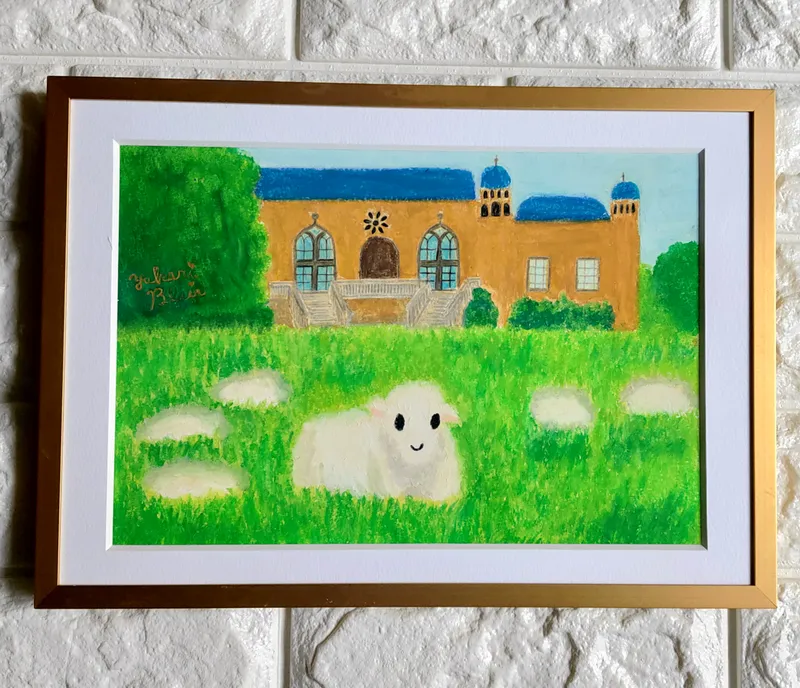 草をはむコッツウォルズの羊さん