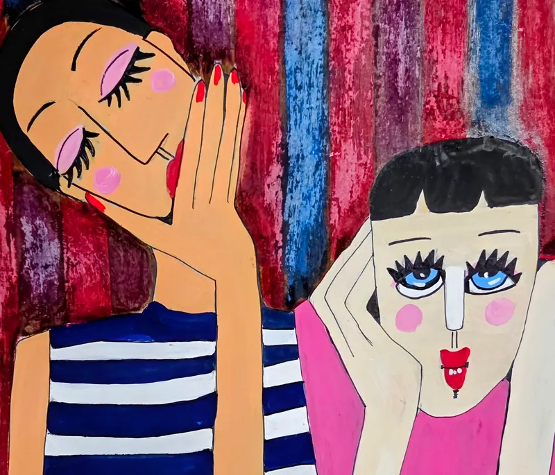 頬杖をつく女性