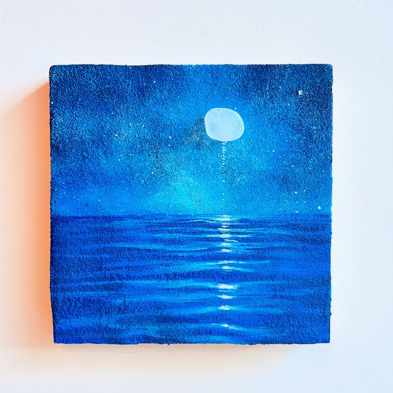 にじむ月、ほどける海