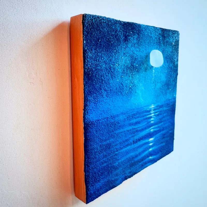 にじむ月、ほどける海