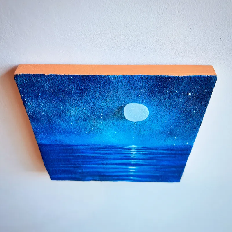 にじむ月、ほどける海