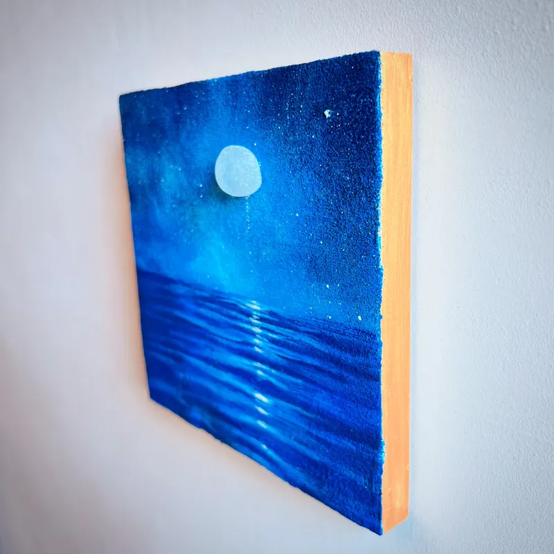 にじむ月、ほどける海