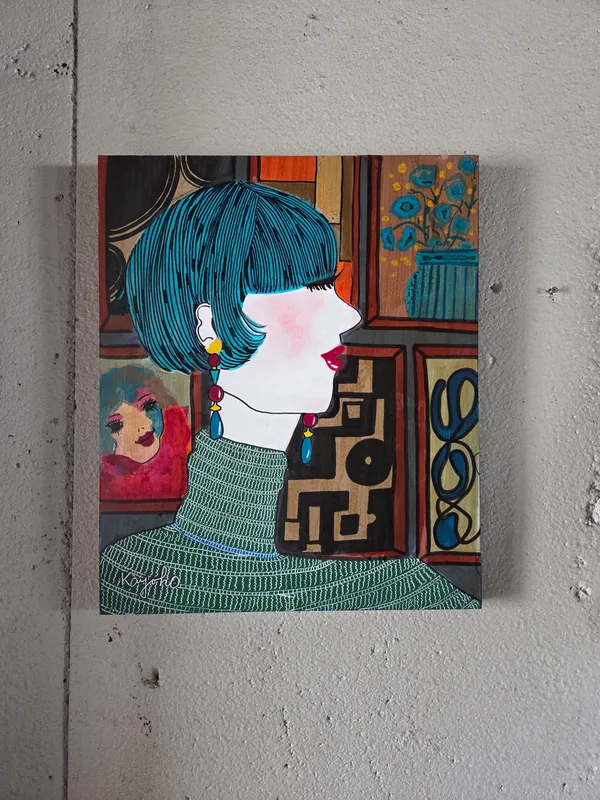 瑠璃色の髪の女性