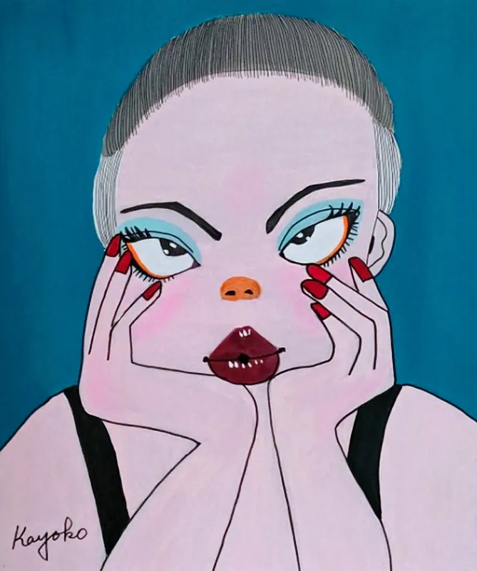 頬杖を付く女性