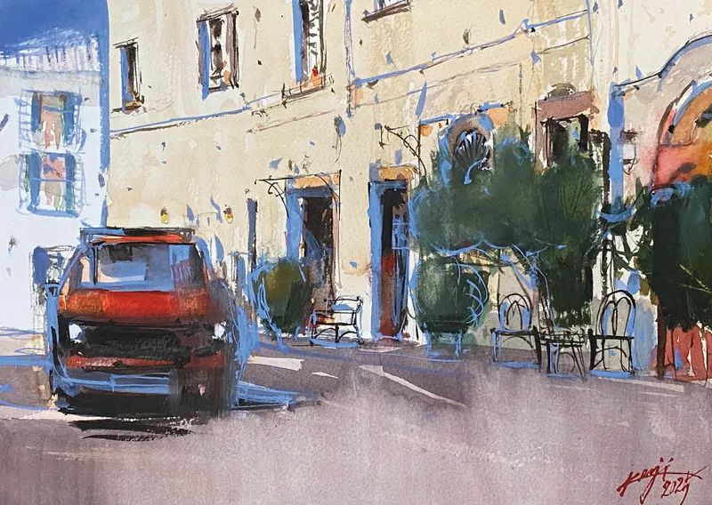 レストランと赤い車