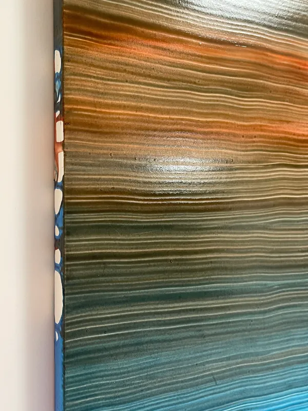 オレンジから青に遷移するストライプ