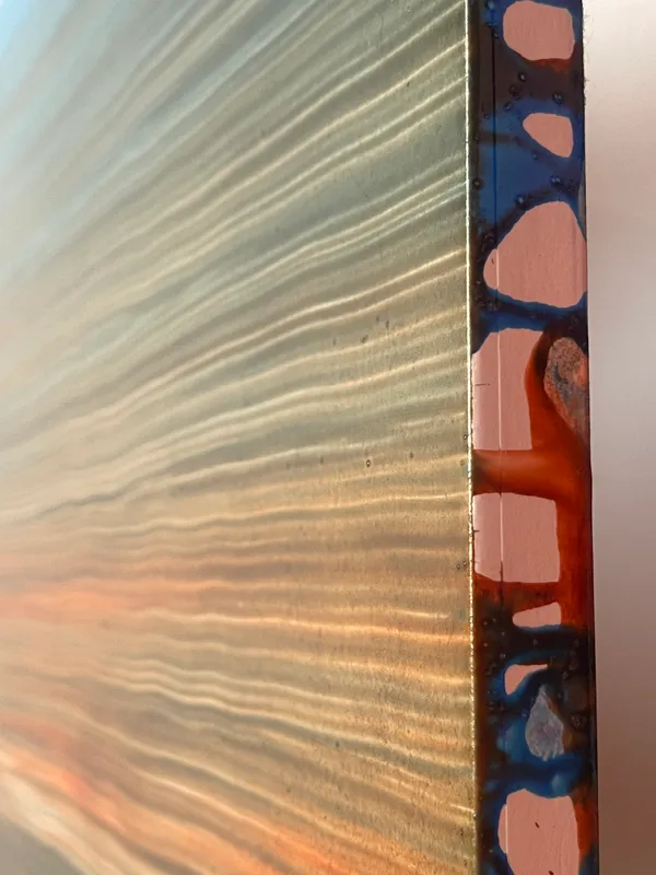 オレンジから青に遷移するストライプ