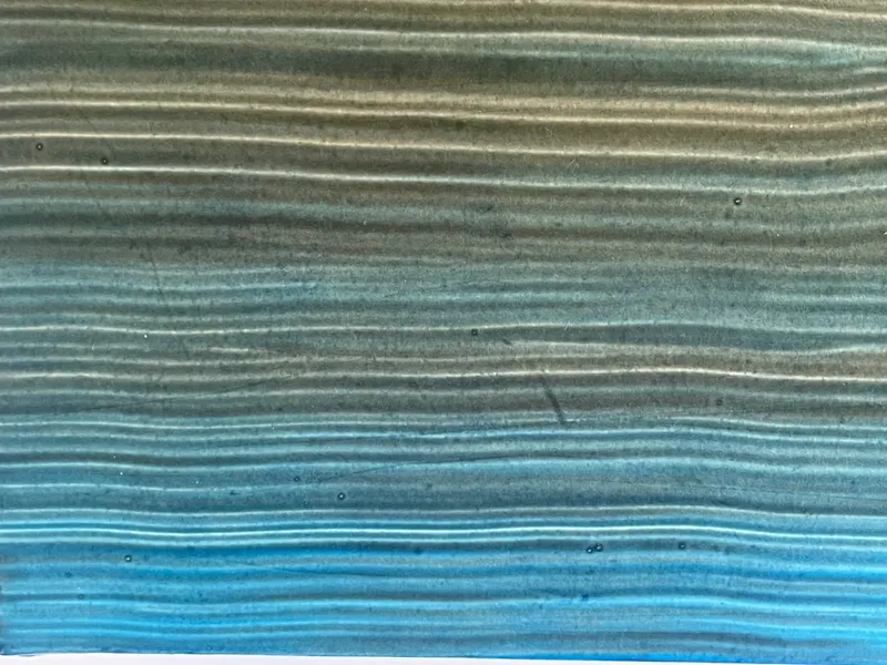 オレンジから青に遷移するストライプ