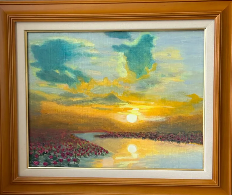 蓮花に映える夕陽